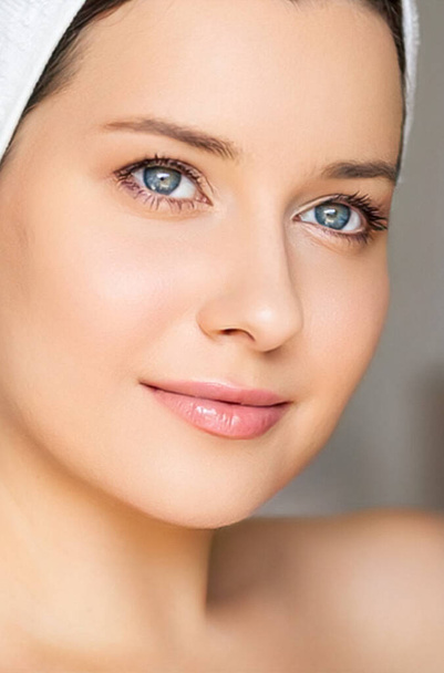 Skin care and beauty routine, beautiful woman with white towel wrapped around head, skincare cosmetics and face cosmetology, close-up portrait - Photo, Image