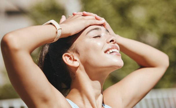 Face, relax and woman in sun happy with outdoor leisure and peaceful break for mental wellness. Stress free latino girl with relaxed, optimistic and positive smile enjoying sunshine rest - Foto, Imagem