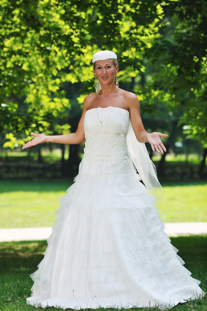 Beautiful bride outdoor - Фото, изображение