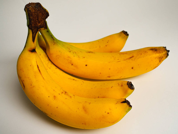 yellow ripe tasty bananas on a white background - Photo, Image