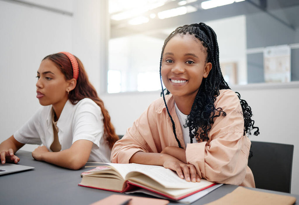 Reading, books and student portrait in university classroom for language learning, education or knowledge. Black woman in lecture or seminar happy with college research, scholarship and English study. - Foto, Bild