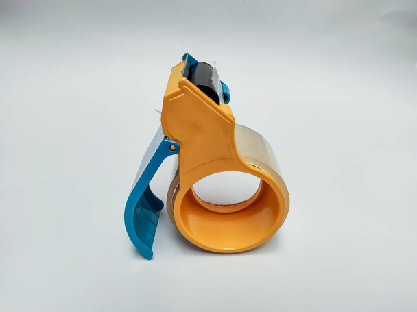 duct tape cutter dispenser and white background - Photo, Image