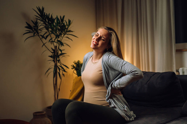 caucasian pregnant woman backache problem - Fotografie, Obrázek