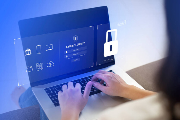 Cybersecurity and data privacy protection concept. And Internet network security technology. hand showing padlock icon. Businesswomen using Laptop. - Fotografie, Obrázek
