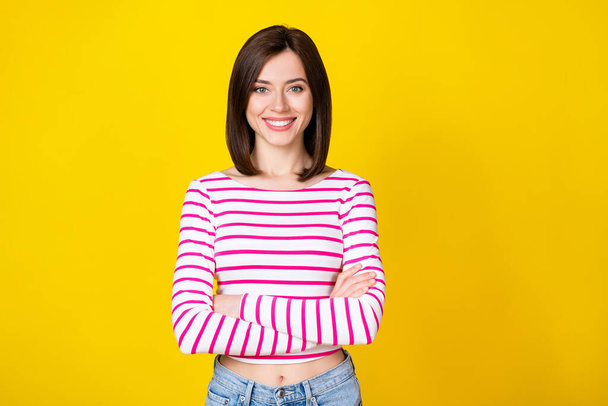 Portrait of young attractive smiling confident woman expert house agent sell isolated on yellow color background. - Foto, imagen