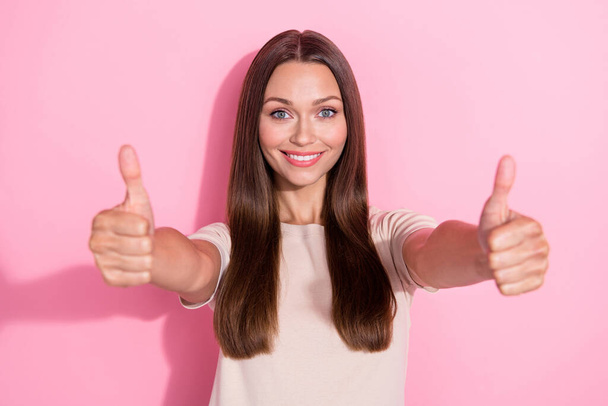 Closeup photo of young adorable manager cute girl wear pastel t-shirt toothy smile showing like feedback new product isolated on bright pink color background. - 写真・画像