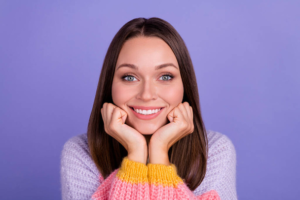 Photo of nice lovely gorgeous woman with long hairdo wear knit pullover arms cheeks smiling at camera isolated on purple color background. - Foto, immagini