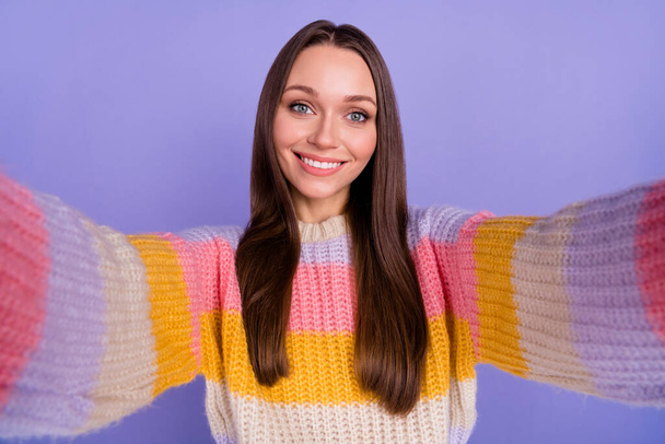Photo of gorgeous nice cute cheerful woman with straight hairdo wear oversize pullover make selfie isolated on violet color background. - Фото, зображення