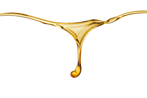 waves of natural honey with splashing, isolated on white - Photo, Image