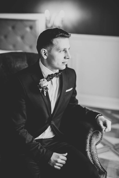 Beautiful man, groom posing and preparing for wedding. - Фото, зображення
