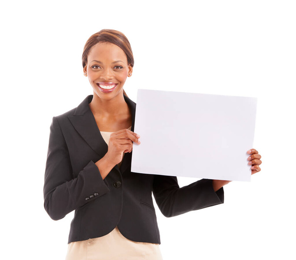 A corporate girl in a corporate world. Portrait of an ethnic woman in corporate clothing holding up a blank plackcard - Foto, Bild
