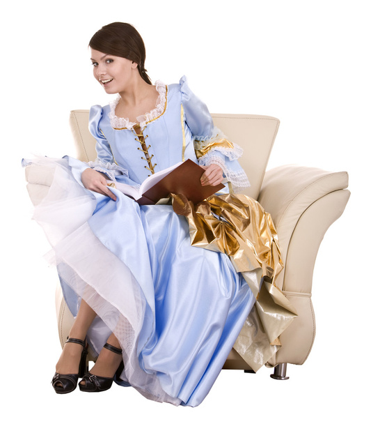 Fille en robe blonde bleue avec livre sur chaise
. - Photo, image
