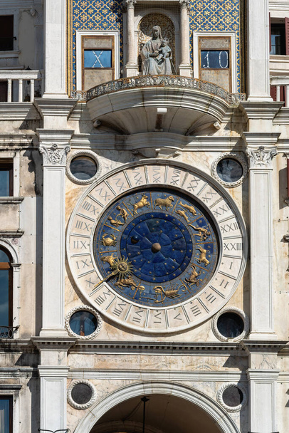 Saint Mark's Clock Tower in Saint Mark's Square (Piazza San Marco), Venice, vintage clock with golden zodiac signs and Roman dial, early Italian Renaissance architectural monument in Venice - Valokuva, kuva