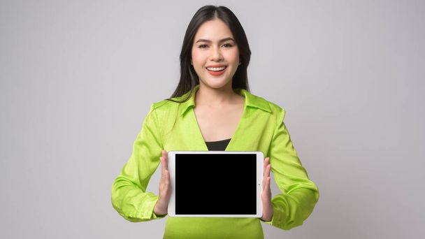 A Beautiful woman using tablet over white background, technology concept. 	 - Fotoğraf, Görsel