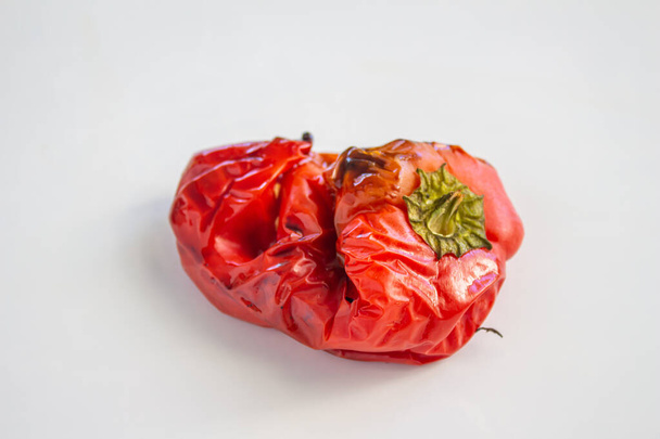 Grilled red capia pepper isolated on white background. Top view. - Fotó, kép