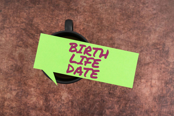Bildunterschrift: Großansicht des Bildes mit der Bildunterschrift: Haben Sie einen guten Tag, Business-Ansatz Tag, an dem ein Baby geboren wird Schwangerschaft geben Leben - Foto, Bild