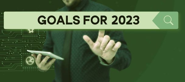 Bildunterschrift: Großansicht des Bildes mit der Bildunterschrift: Ziele für 2023, Konzeptfoto Folgende Dinge wollen Sie 2023 haben und erreichen - Foto, Bild