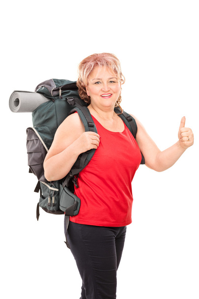 Mature lady with hiking equipment - 写真・画像