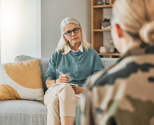 Therapy, support consultation and psychologist talking to a patient about mental health in an office. Senior therapist speaking to a client about a solution to depression or anxiety at a clinic. - Photo, Image