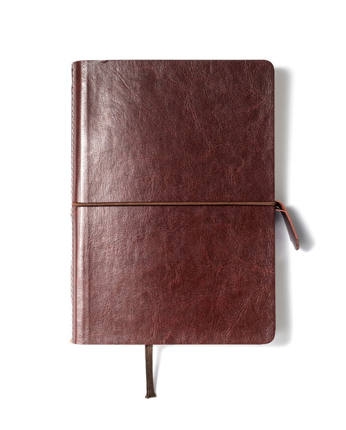 Cuaderno de cuero marrón sobre fondo blanco
 - Foto, imagen