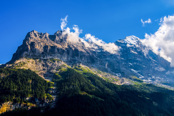 Beautiful Alpine landscape over blue sky, Switzerland. - Photo, Image