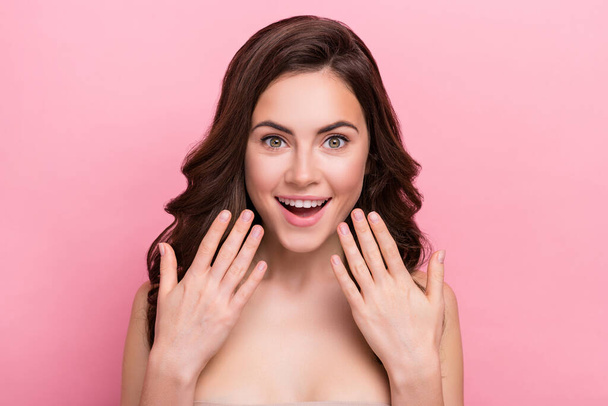 Photo of young excited woman reaction wow pure perfect moisturizing isolated over pink color background. - Foto, Bild