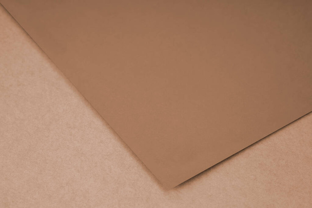 Plain paper sheet lying on textured Background like an open book from top angle - Photo, Image