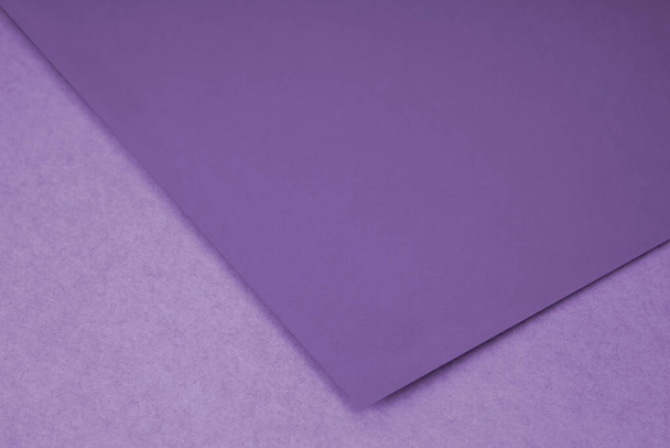 Plain paper sheet lying on textured Background like an open book from top angle - Фото, изображение
