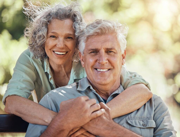Love, hug and senior couple bond in house garden, nature park or home backyard in trust, security or future support. Happy smile portrait, retirement elderly man or Australian woman in life insurance. - Photo, Image