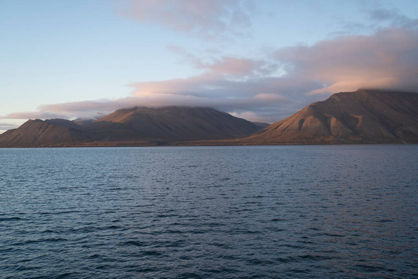 sunset in the arctic coast of Svalbard Islands, Norway. High quality photo - Photo, image