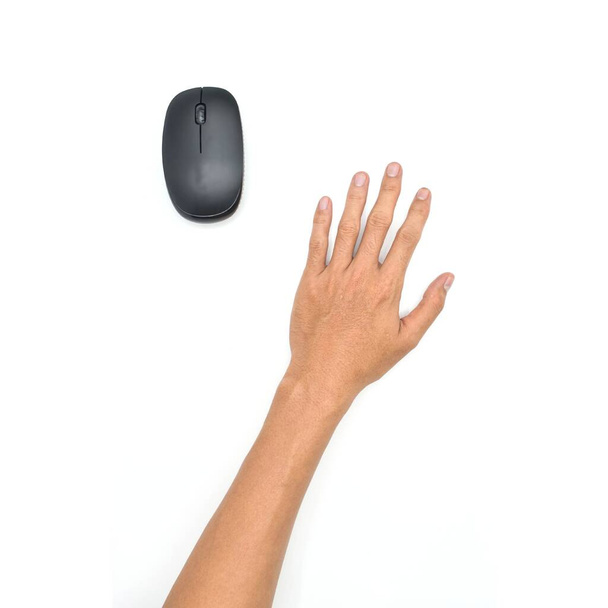 Wireless black mouse and hand of Asian young man. Concept of mouse hand syndrome. - Foto, Bild