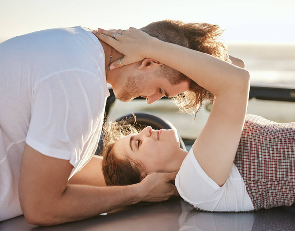 Couple love in sunshine, bonding adventure and happy together, hugging and romantic roadtrip in summer. Man and woman smile, romance and affection, quality time and travel out in nature and sun - Photo, Image