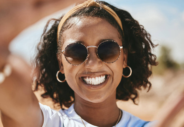 Hand frame, portrait and black woman with smile on holiday in nature of Mexico during summer. Happy African girl with hands for focus on face on vacation in the desert, park or safari to relax. - Photo, image