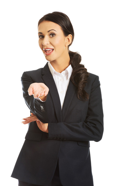 Portrait of a businesswoman offering teamwork - Zdjęcie, obraz