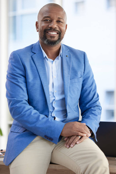 Black man, entrepreneur and businessman success in a office with proud company vision. Startup boss, manager and leadership portrait of a senior ceo happy about working and workplace growth. - Foto, Imagen