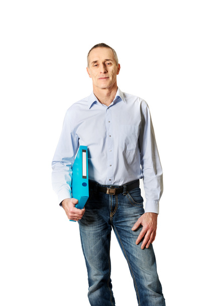 Handsome man holding blue binder - Φωτογραφία, εικόνα