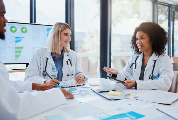 Healthcare, meeting and teamwork with a doctor and her team planning for growth, research and innovation in the medical industry. Collaboration, medicine and communication with a woman surgeon. - Photo, Image