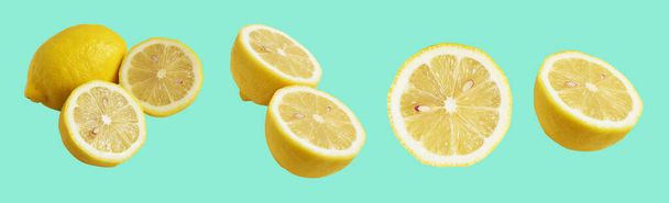 Fresh yellow lemon fruit isolated with clipping path, no shadow, pieces, half, slices in green background - Fotó, kép