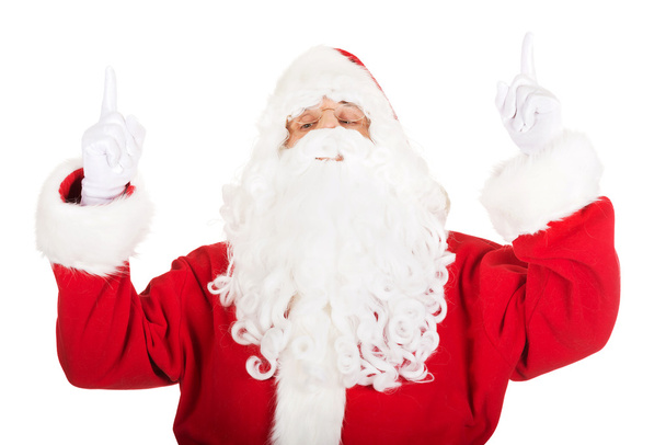 Santa Claus pointing his hands up - Photo, image
