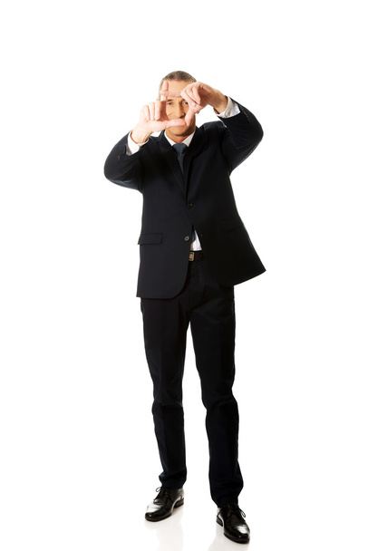 Full length businessman gesturing frame - Foto, Imagem