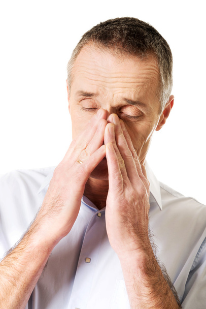 Mature man suffering from sinus pressure pain - Photo, Image