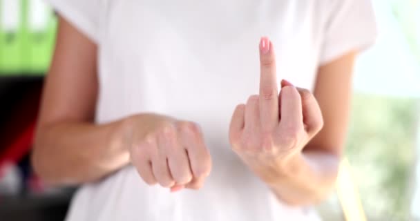 Woman hands removes gesture fuck you closeup. Confident, serious businesswoman showing middle finger fuck off - Πλάνα, βίντεο