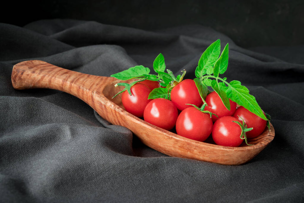 red  tomatoes branch on table  background, healthy food  - Photo, Image