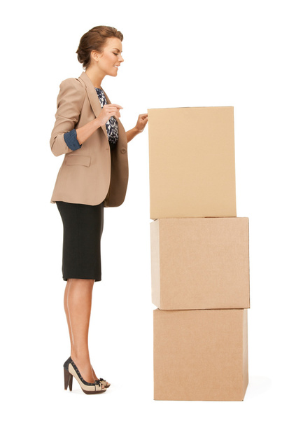 Attractive businesswoman with big boxes - Zdjęcie, obraz