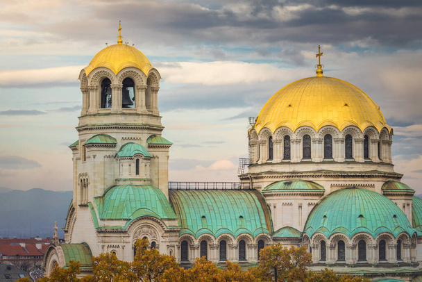 St. Alexander Nevski Cathedral in Sofia at dramatic sunset, Bulgaria, Eastern Europe - 写真・画像