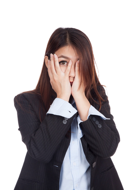Young Asian businesswoman peeking though her fingers - Foto, Bild