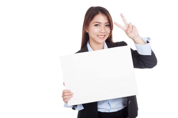 Young Asian businesswoman show victory sign and  blank sign - Фото, зображення