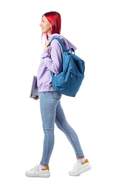 Young female student with bright unusual hair on white background - Valokuva, kuva