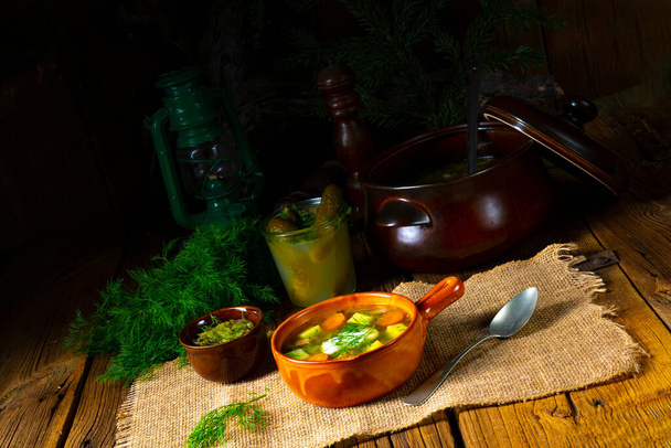 Polish sour cucumber soup with dill - 写真・画像