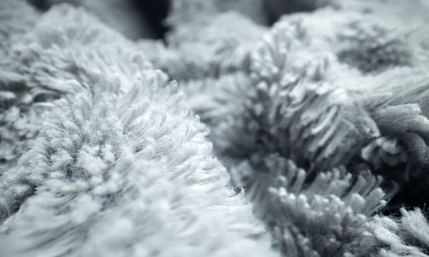 Light grey synthetic fur details. Macro view. - Foto, Bild